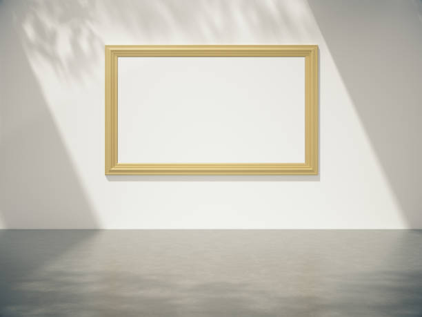 istock Golden picture frame hang on the wall with Trees shadow on the wall .3D rendering 1215860012