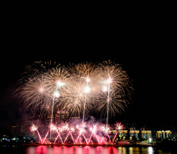 istock Fireworks blooming over the city 1215862230