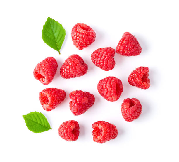 istock ripe raspberries isolated on white background. top view 1215862993