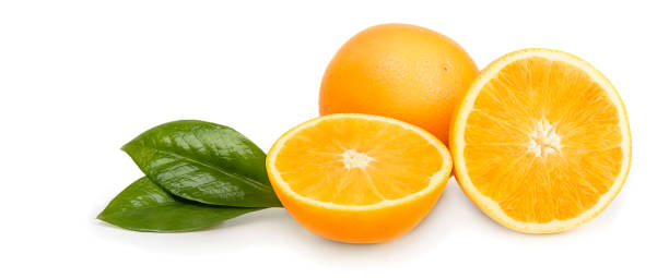 istock Orange whole and cut into halves with leaves. Isolated on a white background. 1215863192