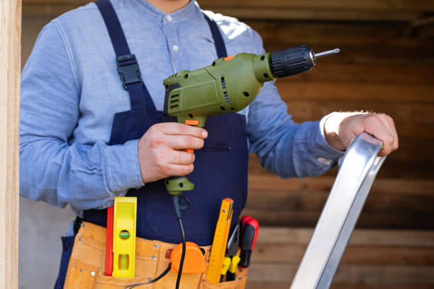 istock Electric drill in young man's hands 1215864504