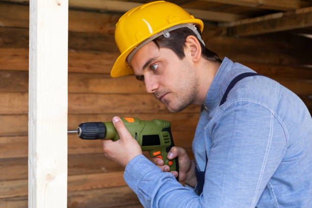 istock Handsome craftsman holding electric drill 1215864613