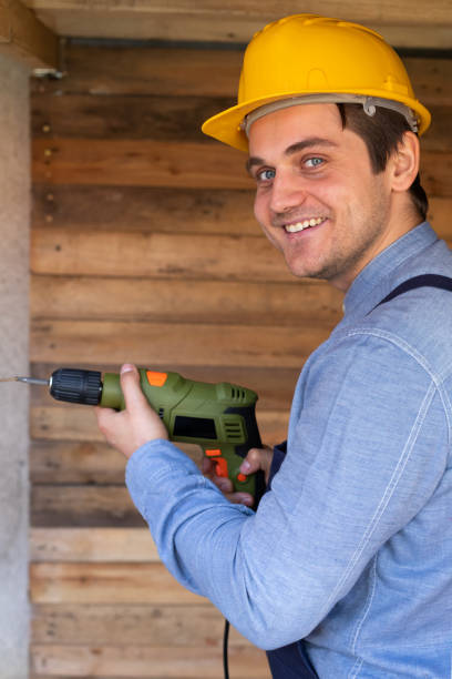 istock Handsome craftsman holding electric drill 1215864874