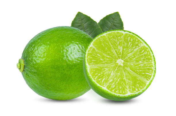 istock Fresh lime with leaf isolated on white background. full depth of field 1215865148