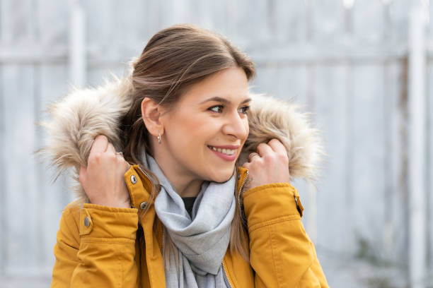 istock Attractive woman with yellow jacket 1215866037