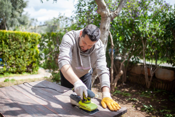 istock Man sanding wood furniture 1215867464