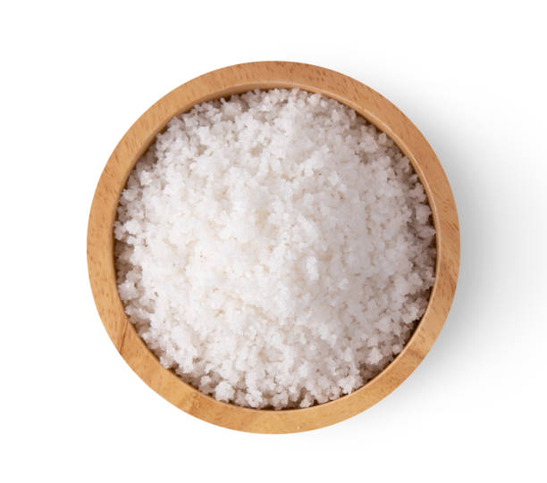 istock salt in wood bowl isolated on white background. top view 1215867778