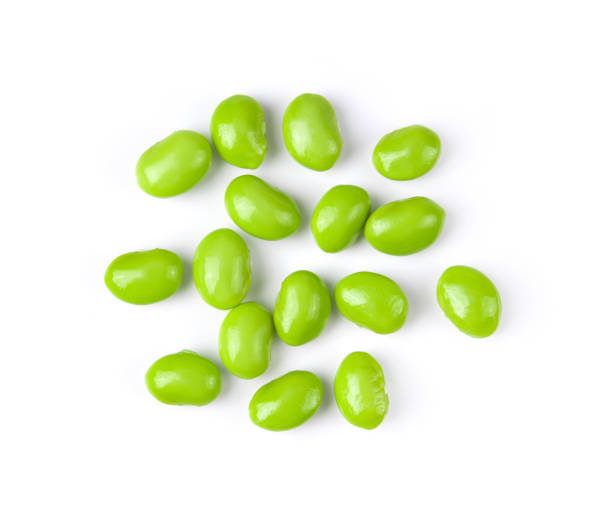 istock Green soy beans  on white background top view. 1215868704