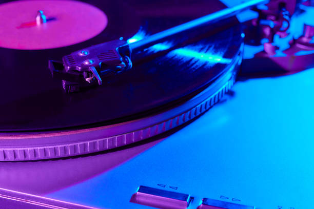 istock Retro wave, 80s. Record player with neon light. Vinyl analog turntable. Synthwave and vaporwave concept. 1215869218