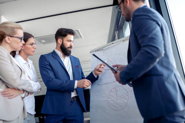 istock Group of business people working together 1215870623