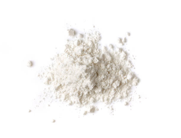 istock Pile of flour isolated on white background. Top view 1215871361
