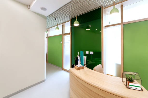 Lobby entrance with reception desk in a dental clinic. Modern interior design. Lobby at  dental clinic. medical office lobby stock pictures, royalty-free photos & images