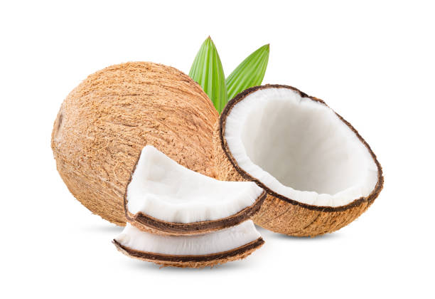 istock coconut isolated with leaf  on white background. full depth of field 1215873972