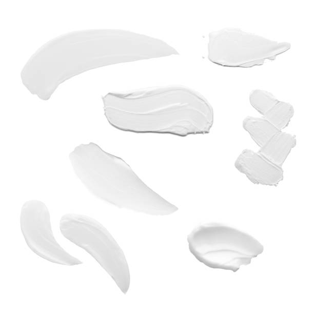swabs of creamy textures. strokes of body lotion or hand cream in different shapes and sizes. smear of skincare cosmetics product. cosmetology wellness and beauty concept. isolated on white - soap body imagens e fotografias de stock