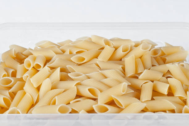 istock Pasta texture. Many yellow pasta are piled on the pile. 1215879675