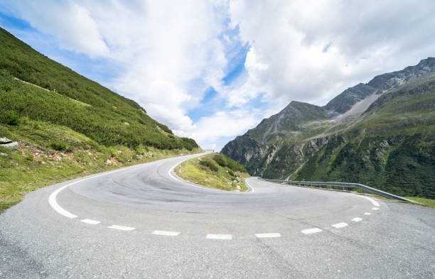 istock Mountain road with 180 degree turn 1215880370