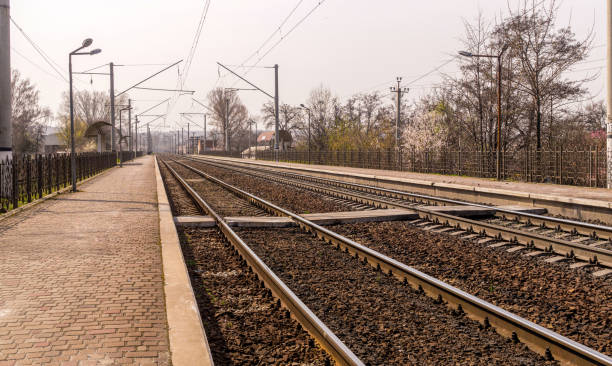 old deserted railway peron. abandoned station in harming quarantine and lockdown - harming imagens e fotografias de stock