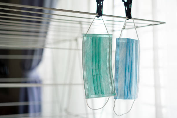 istock Medical face masks on cloth drying rack 1215881794