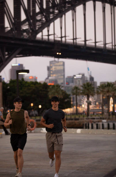 istock Friends Running Together 1215882219