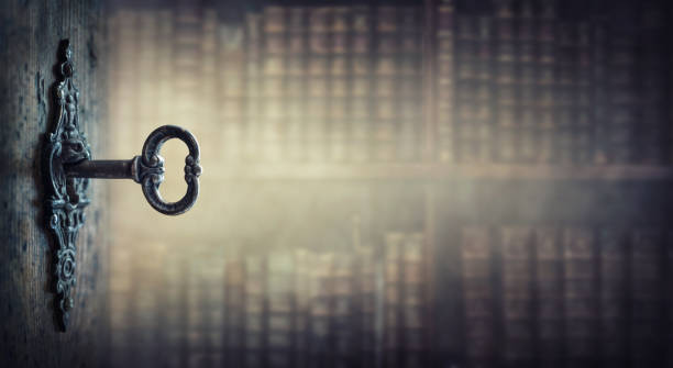 istock Old key in keyhole, macro shot. Gothic style. Key to knowledge. Concept and Idea for History, education, business, security, secret background. 1215882411