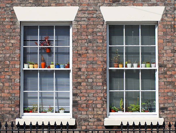 British windows with coloured small flower vases