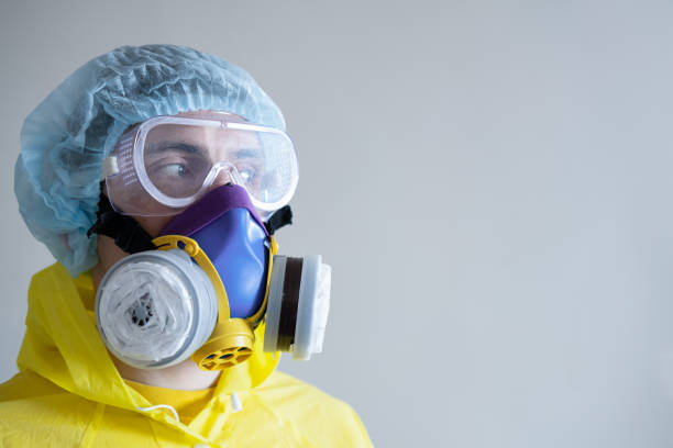 istock Man in protective face mask and eyeglasses, copy space . 1215884025