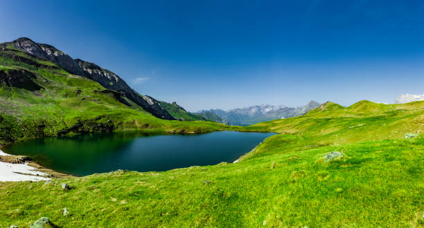 istock Mountain lake at Col de Tente in the Pyrenees 1215884975