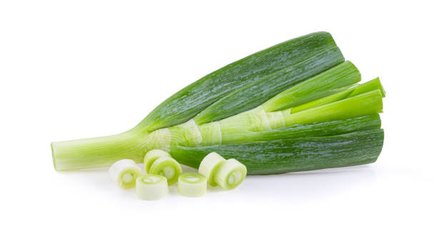 istock Green onion isolated on the white background 1215886011