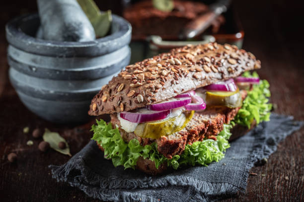 istock Spicy pate sandwich with lettuce and pickled cucumbers as snack 1215888068