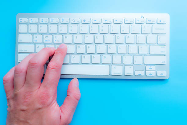 istock Hands on the keyboard close up view 1215888674