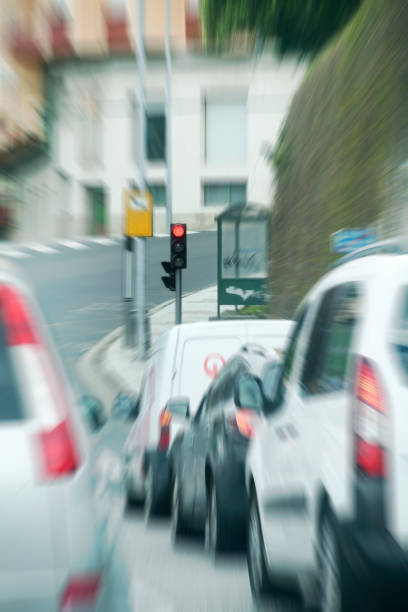 istock Street view , red traffic tail lights, stop light, city life. 1215890871