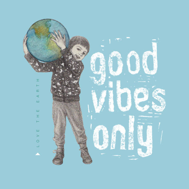 istock Little Boy Holding World Globe. Good Vibes Only. Positive message. 1215891839