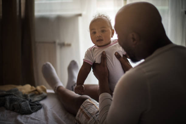 istock Raising his child with so much love. 1215892032