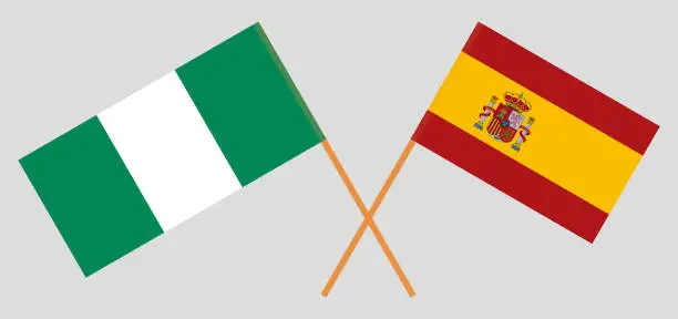 Vector illustration of Crossed flags of Nigeria and Spain