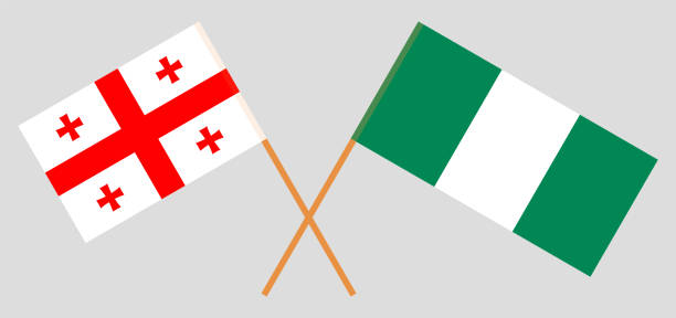Crossed flags of Nigeria and Georgia Crossed flags of Nigeria and Georgia. Official colors. Correct proportion. Vector illustration georgia football stock illustrations