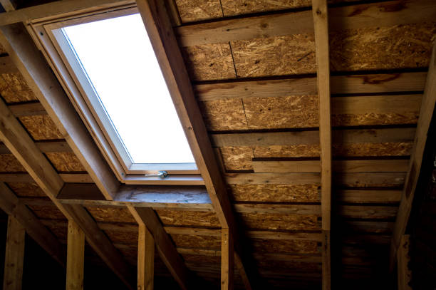 istock Wooden attic at home with window 1215892745