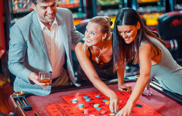 istock People gambling in the casino 1215893387