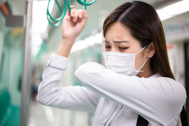istock Asian woman cough with mask 1215894934