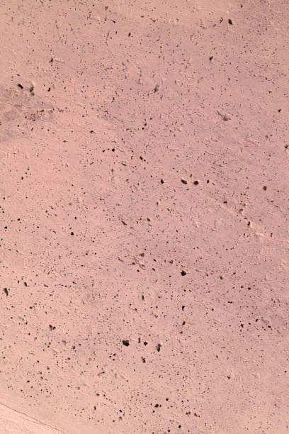 istock The pink concrete wall. The wall is textured. 1215897540