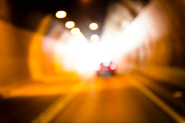 defocused car lights in a tunnel