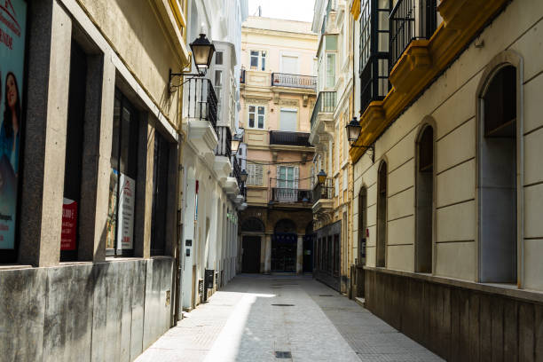 Changes and complications caused by coronavirus epidemy, world without crowds, virus empties streets and parks. Almost empty street in Seville, Spain, 2020.