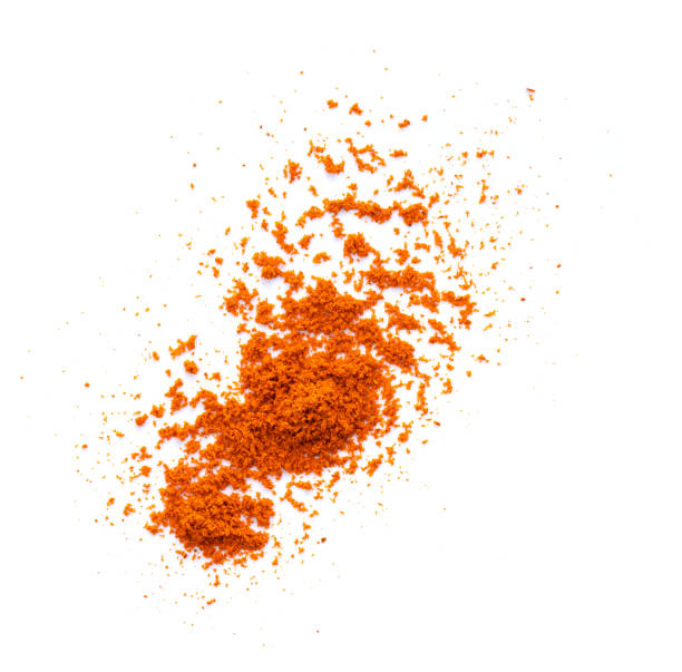 istock Crushed red chili pepper isolated on white background. top view 1215898733