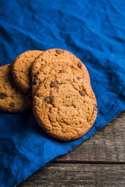 istock Fresh and healthy cookies with chocolate and seeds on the rustic background 1215899259