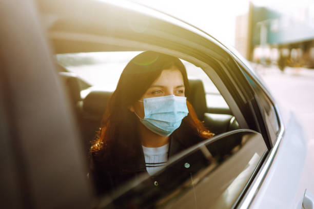 istock Young woman wearing face protective mask to prevent Coronavirus 1215903744