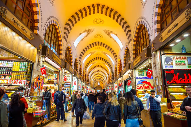 Spice Bazaar in Istanbul, Turkey. This pic shows A crowd of people walking inside the Spice Bazaar in Istanbul, Turkey. grand bazaar istanbul stock pictures, royalty-free photos & images