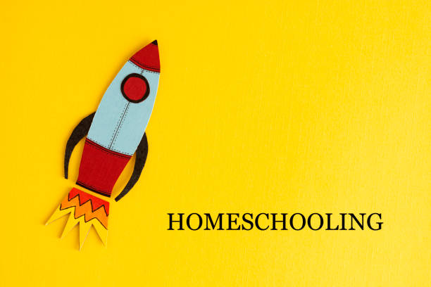 istock Homeschooling text with rocket over yellow abstract background. Learn from home concept. Quarantine education. 1215911268