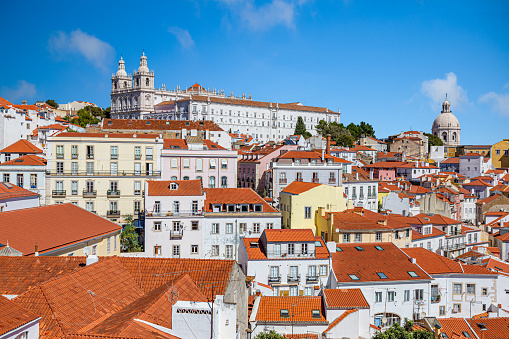 Picture over roofs of old city in Lisboa with church of Sao Vicennte of Fora and Igreja de Santa Engracia