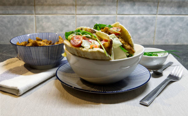 istock Vegan Pitta Bread with Salad and Soy Meat 1215913390