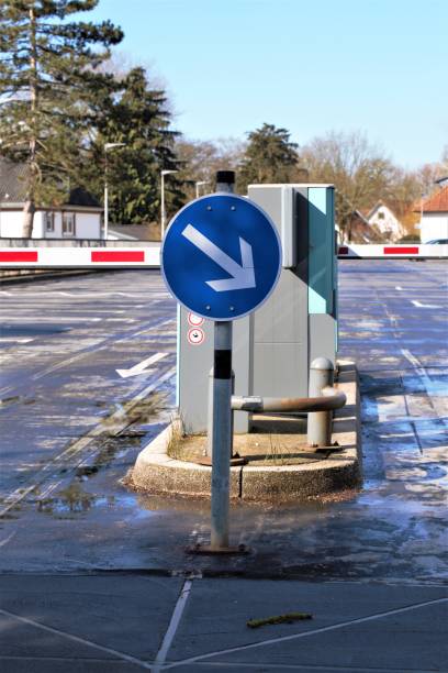 istock no parking sign on road 1215914274