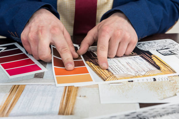istock designer work at office with home creative sketch and color sample for modern renovation 1215916068